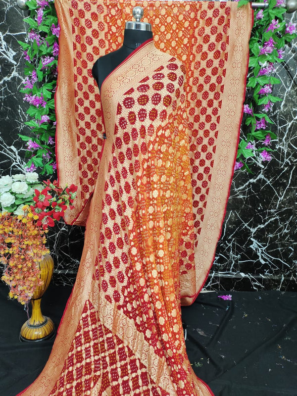 Pure Khaddi Georgotte Banarasi Nakshi Bandhej Saree in Red Orange Dual Tone
