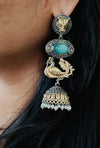 Long Peacock Statement Dual Tone German Silver Jhumkas
